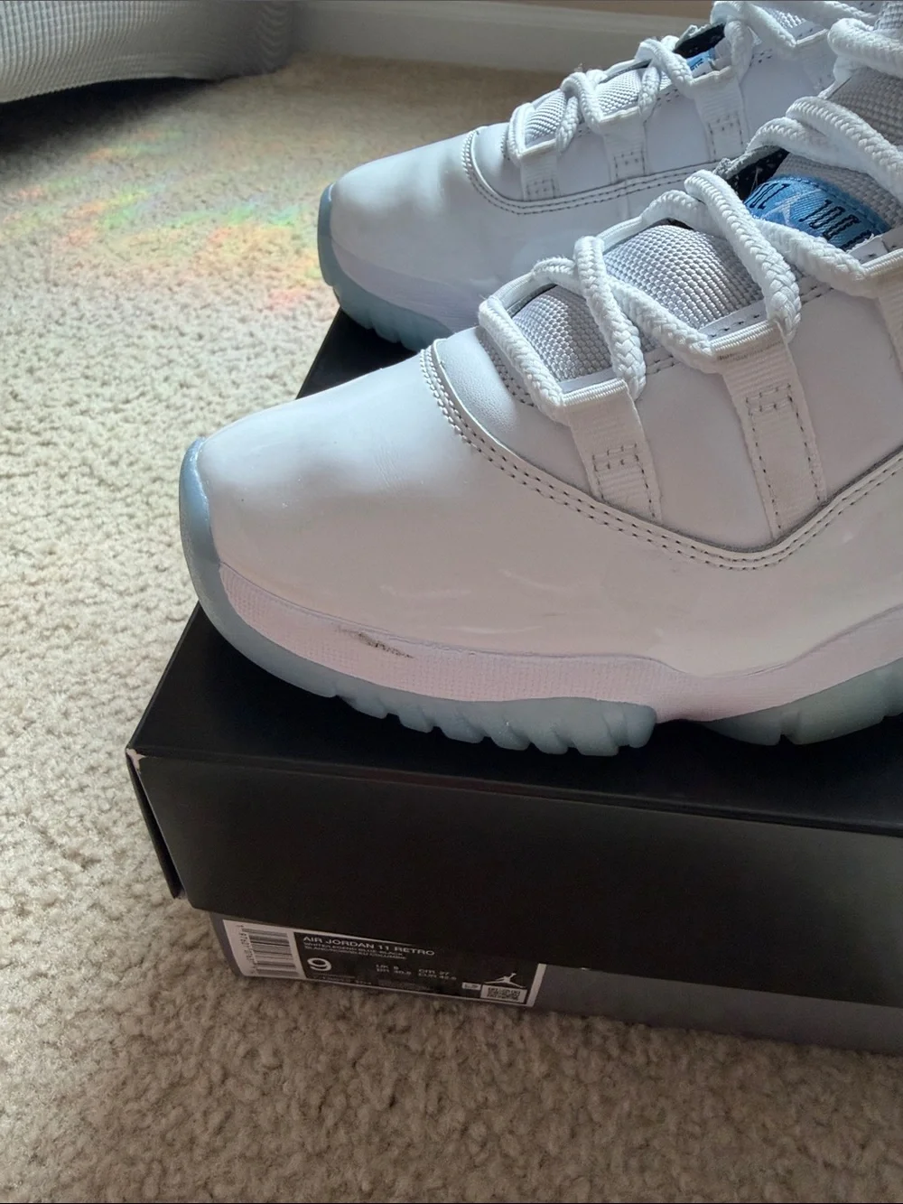 Jordan Air Jordan 11 Retro White and Light Blue Sneakers